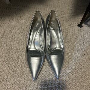 Silver kitten heel pumps